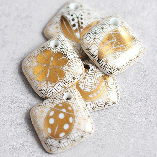 Porte-Bonheur - La collection de Fèves-Bijoux Or